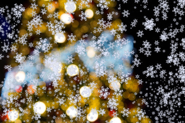 Christmas tree and festive bokeh lighting with snowflake for Christmas ,frost falling concept