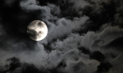 Fototapeta na wymiar eerie sky with blue moon on halloween