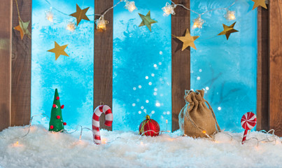 christmas cozy interior background with window sill illuminated with lights