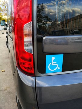 mini van with symbol for disabled transport