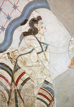 Wall painting of the ancient House of the Ladies depicting a female figure from Minoan Settlement of Akrotiri, located on the Santorini island, Cyclades, Greece