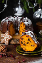 Pumpkin cake with chocolate glaze on rustic background