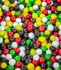 Fototapeta na wymiar Colorful rainbow lollipop candy background