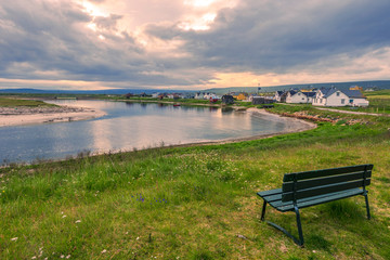 Skallev village in Vadso Municipality of Norwegian Finnmark, as seen from the border of Varangerfjord, were the Skallev river join the Barents Sea.