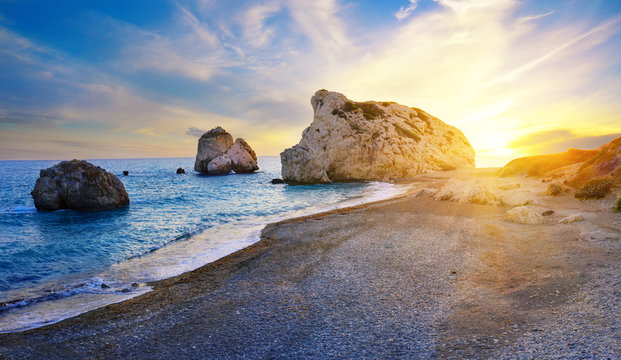 Aphrodite's beach and stone at sunset in bright sunshine