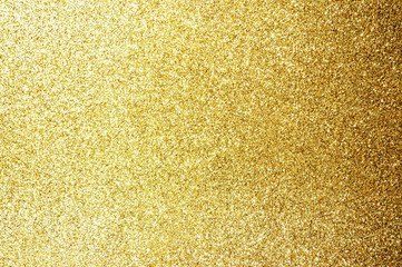 Gold,yellow abstract light background,Gold bokeh shining lights,sparkling glittering Christmas lights.Season greeting background.New year Luxury backdrop image.Blurred abstract holiday background.