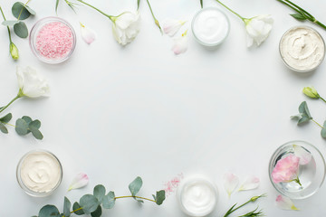 Fototapeta na wymiar Eco frame of natural spa products on white background