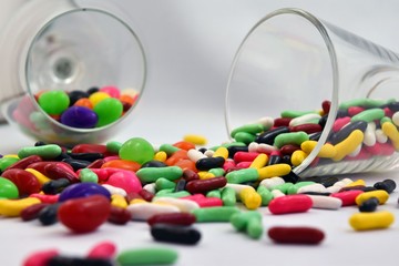 colorful pills on white background