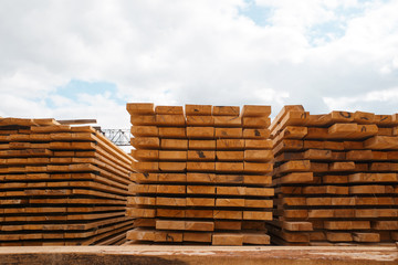 Stacks of boards on timber mill warehouse