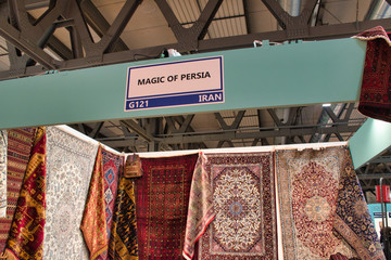 Obraz premium Artigiano in Fiera, a unique fair to buy, see, touch hand-crafted creations, try the best international cuisine from all over the world. Unique, original, the highest quality