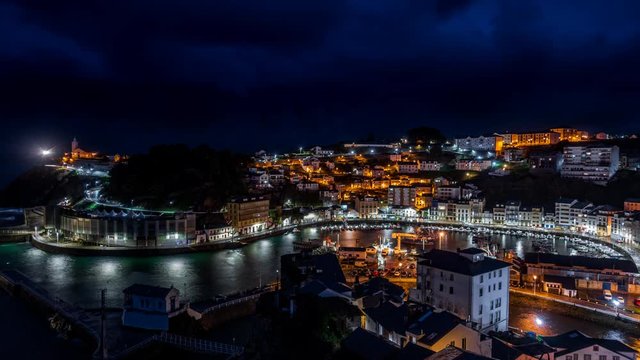Night over Luarca city time lapse, top view