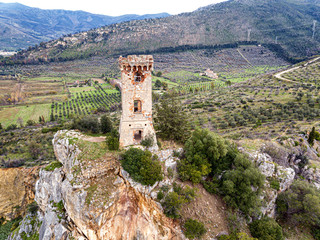 Ancient tower on the cliff of a small hill, Tuscany, Italy