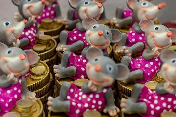 Fototapeta na wymiar Mouses is symbols of new 2020 year. Gray toys. Front view.