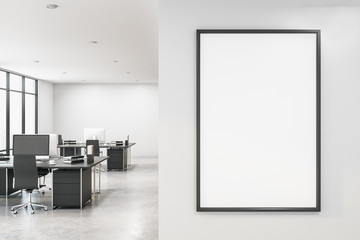Office with blank poster