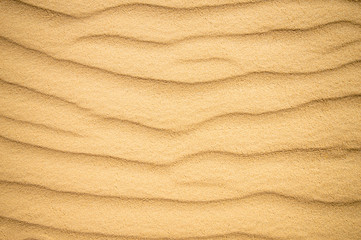 Summer sand dune pattern for background. Close-up of patterns in a sand dune with ripples, sand...