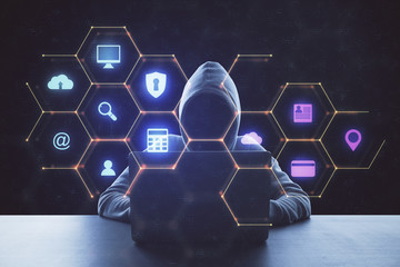 Hacker using laptop