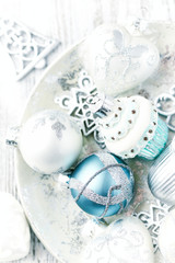 Obraz na płótnie Canvas Christmas ornaments on bright background. Top view. Close up. 