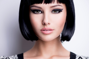 Fototapeta premium Beautiful brunette woman with short hairstyle.