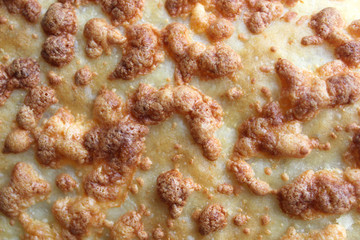 texture of white bread and baked cheese