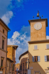 2019-11-02 A CLOCK TOWER IN TUSCANY ITALY.
