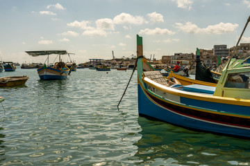 view of the harbor with boats, of marsaxlokk on malta