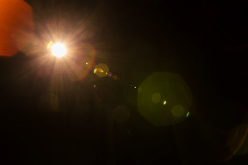Lomography camera lens flare on a black background with high aperture