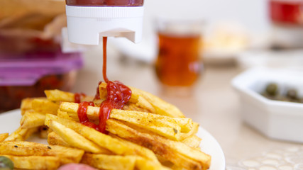 fried potatoes and spill ketchup on it