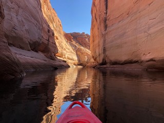 Exploring sunny Antelope Canyon from kayak in Arizona, USA - obrazy, fototapety, plakaty
