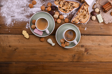 A traditional Dutch holiday for children of Sinterklaas. Winter holidays in Europe and the Netherlands. Stollen with cranberries and icing sugar. A form for writing text and aromatic coffee.