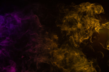 moody purple and yellow smoke on black background