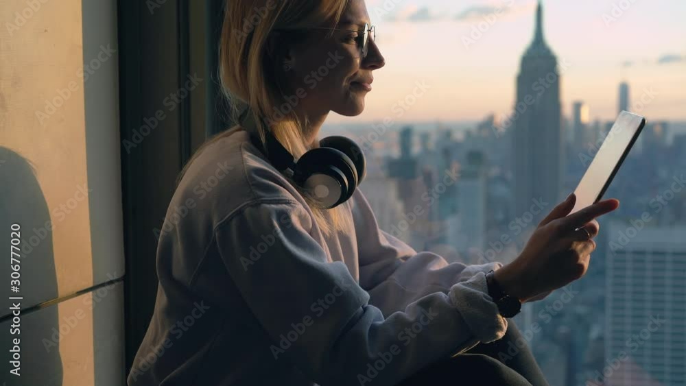 Poster zoom out of happy millennial generation z connected to 4g wireless on modern touch pad for online ne