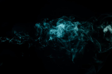 Whispy Turquoise smoke on black background