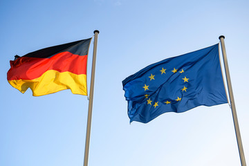 State flag of Federal Republic of Germany and the flag of the European Union.