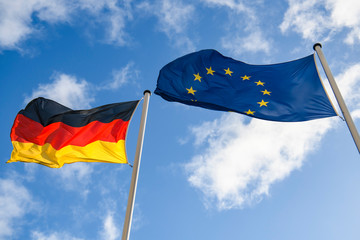 State flag of Federal Republic of Germany and the flag of the European Union.