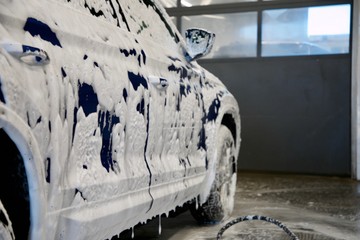  foam washing car macro