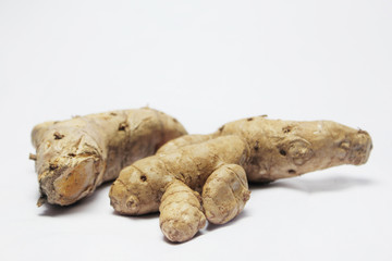 turmeric root on white background