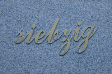 number in handwriting made of stainless steel, house number,