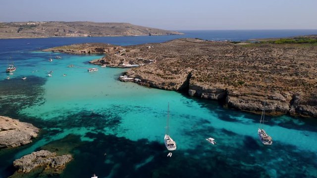 Aerial drone video of Blue lagoon Gozo Malta Comino island. Best beaches of Mediterranean Europe