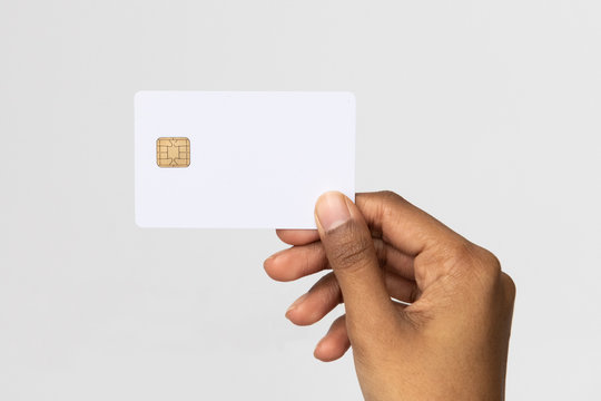 Studio shot of ethnic hand holding a credit card