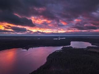 Fototapeta premium Lake with islands and a purple sunset, aerial panorama