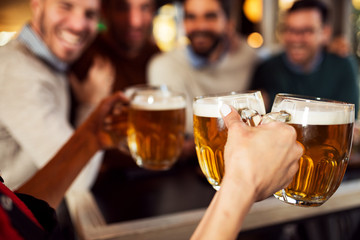 Waitress brings a beer in a pub