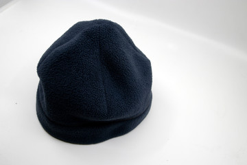 Blue gore tex hat in white background