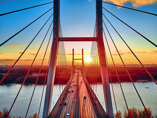 Beautiful panoramic aerial drone view to cable-stayed Siekierkowski Bridge over the Vistula river...