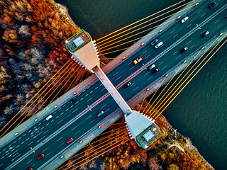 Beautiful panoramic aerial drone view to cable-stayed Siekierkowski Bridge over the Vistula river...