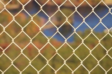 View of the lake from the top of stone mountain in Atlanta USA, Aerial view through the white metal fence, Autumn in GA USA.