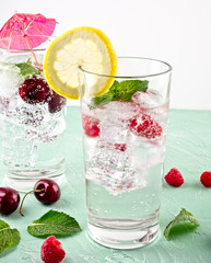 Detox infused flavored water with raspberry, limon and cherry - 306792815