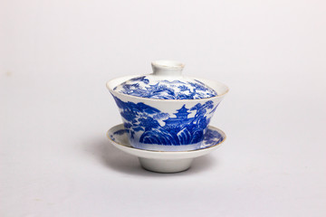 An antique Fine porcelain cup and saucer isolated on white background