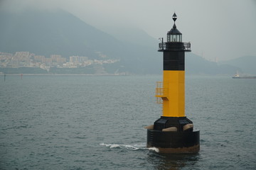 black and yellow lighthouse