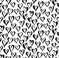 Hand-drawn doodle seamless pattern with hearts. Vector ornament for wrapping paper, wallpapers, web design etc.