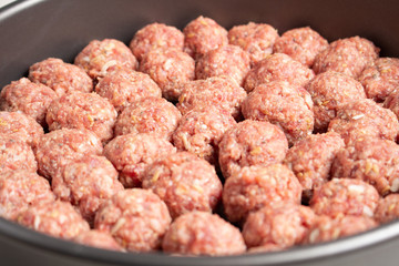 raw minced meatballs ready to prepary cooking concept on clear background